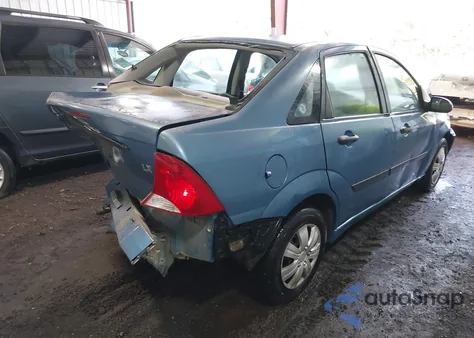 2000 Ford Focus Lx из США, поврежденный, VIN 1FAFP33P9YW265353